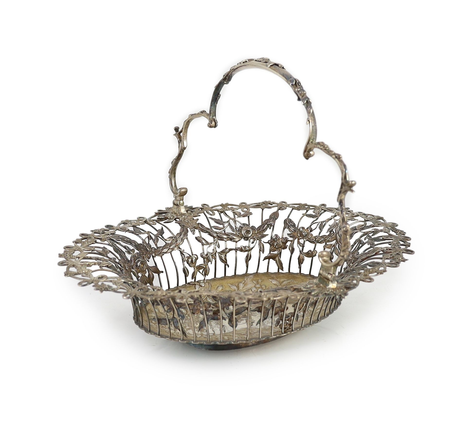 A George III pierced silver oval epergne basket, by Vere & Lutwyche, engraved with the Heneage family crest